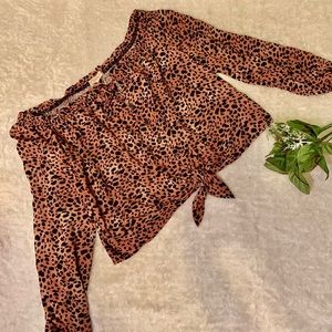 Rewind Leopard print off the should shirt!